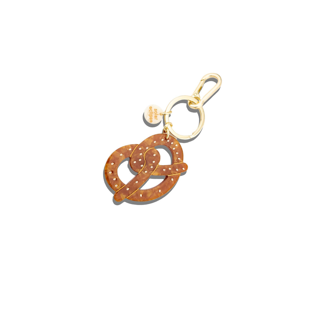 Solar Eclipse - Pretzel handpainted bag charm + key chain | Scout & Co