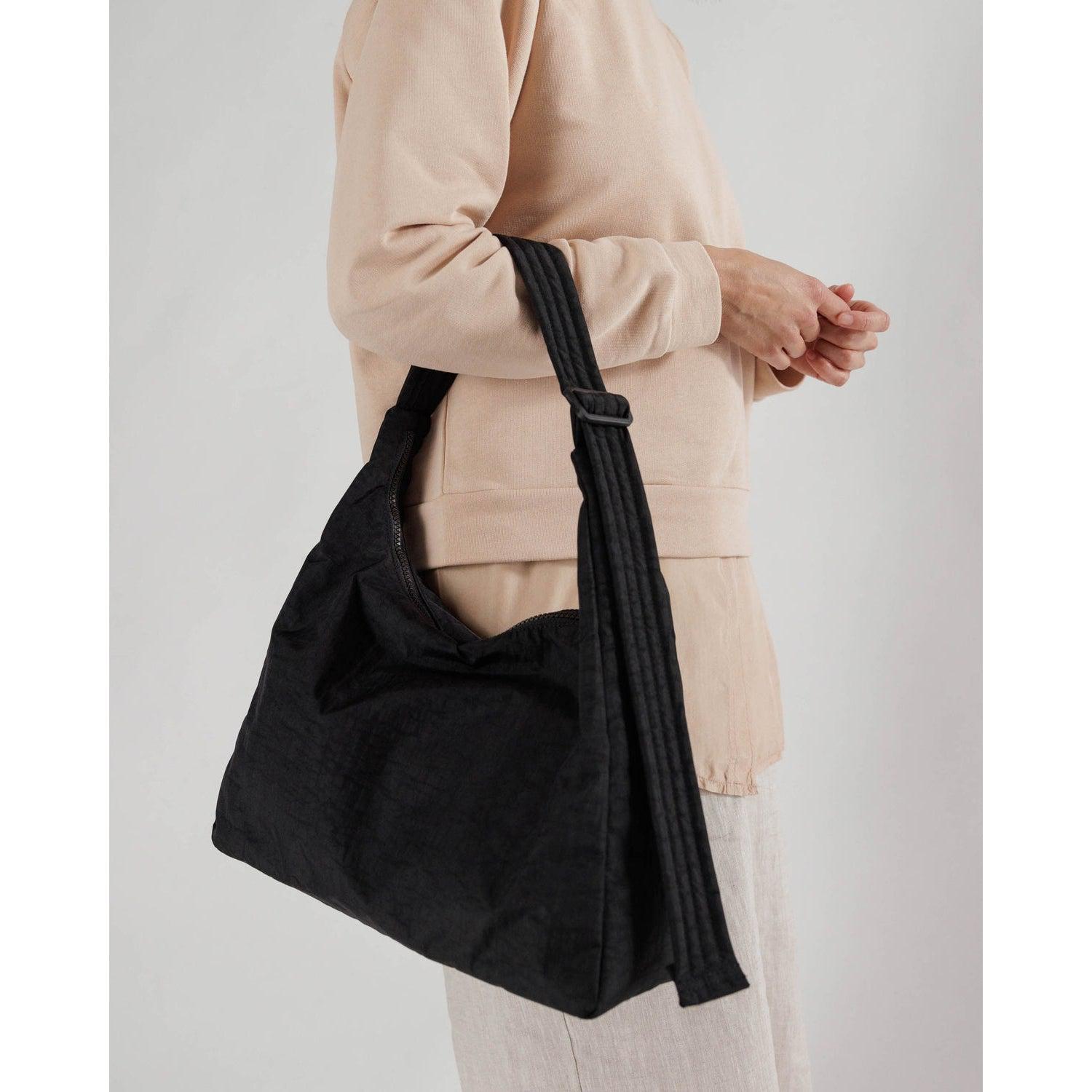 ASOS DESIGN nylon curved 90s shoulder bag in black | ASOS